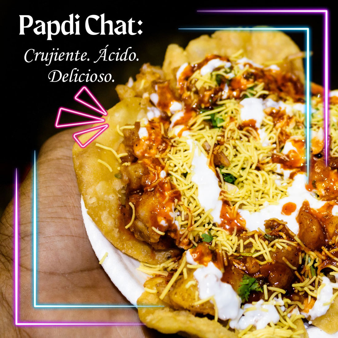 Papdi Chat_A vibrant plate of Papdi Chaat topped with crispy papdis, sev, tangy tamarind chutney, yogurt, and fresh cilantro, showcasing Indian street food flavors.