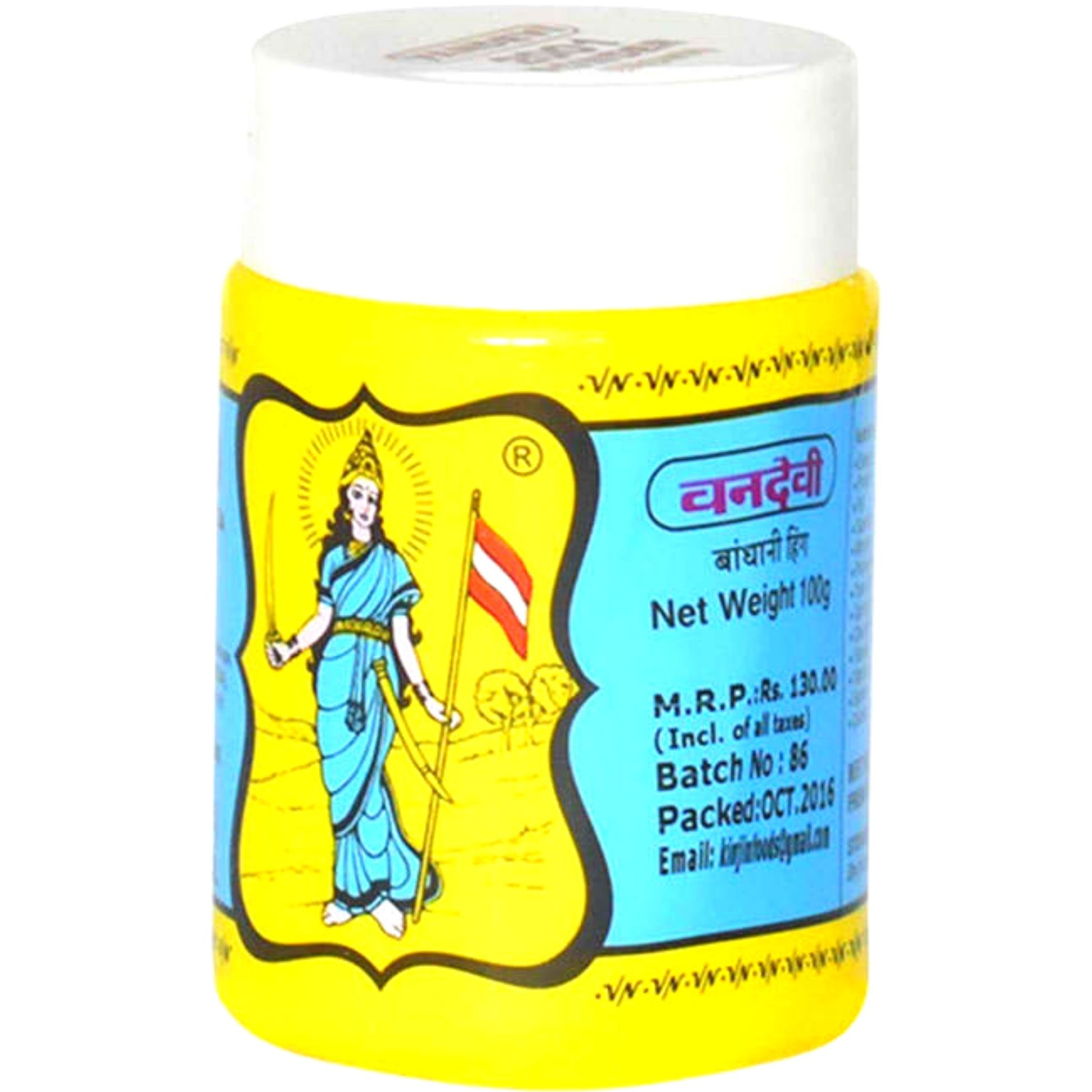 Botella de Asafoetida Vandevi 100g con embalaje tradicional indio, con una etiqueta amarilla y azul que muestra una ilustración de una diosa sosteniendo una bandera