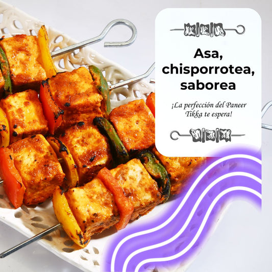 Paneer Tikka: Juicy pieces of Paneer Tikka grilled with bell peppers, capturing the smoky and spicy essence of this popular Indian appetizer.