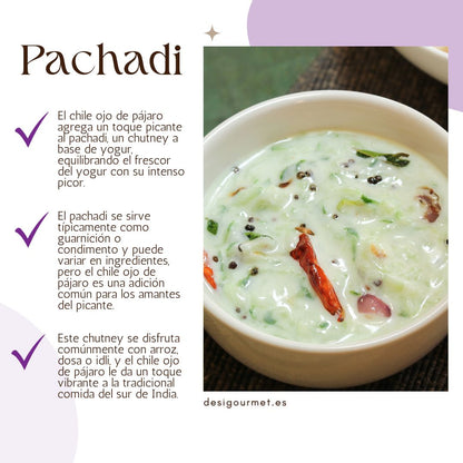 El chile ojo de pájaro agrega un toque picante al pachadi, un chutney a base de yogur, equilibrando el frescor del yogur con su intenso picor.
El pachadi se sirve típicamente como guarnición o condimento y puede variar en ingredientes, pero el chile ojo de pájaro es una adición común para los amantes del picante.
Este chutney se disfruta comúnmente con arroz, dosa o idli, y el chile ojo de pájaro le da un toque vibrante a la tradicional comida del sur de India.