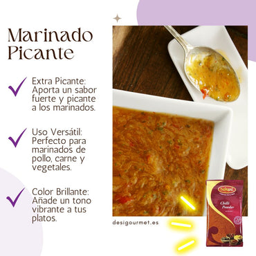 Spicy Marinade with Chilli Powder Alt text: "Bowl of spicy marinade with a spoon, infused with extra hot Schani Chilli Powder. The marinade adds a vibrant color and intense heat, perfect for marinating chicken, meat, or vegetables."