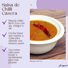 Cargar imagen en el visor de la galería, Meta Description: Enhance your meals with Salsa de Chilli Casera, a homemade chilli sauce made with Bird&#39;s Eye Chilli, garlic, vinegar, and salt. This versatile sauce can be used as a dip or condiment to add a spicy touch to any dish. Get the recipe at Desi Gourmet!