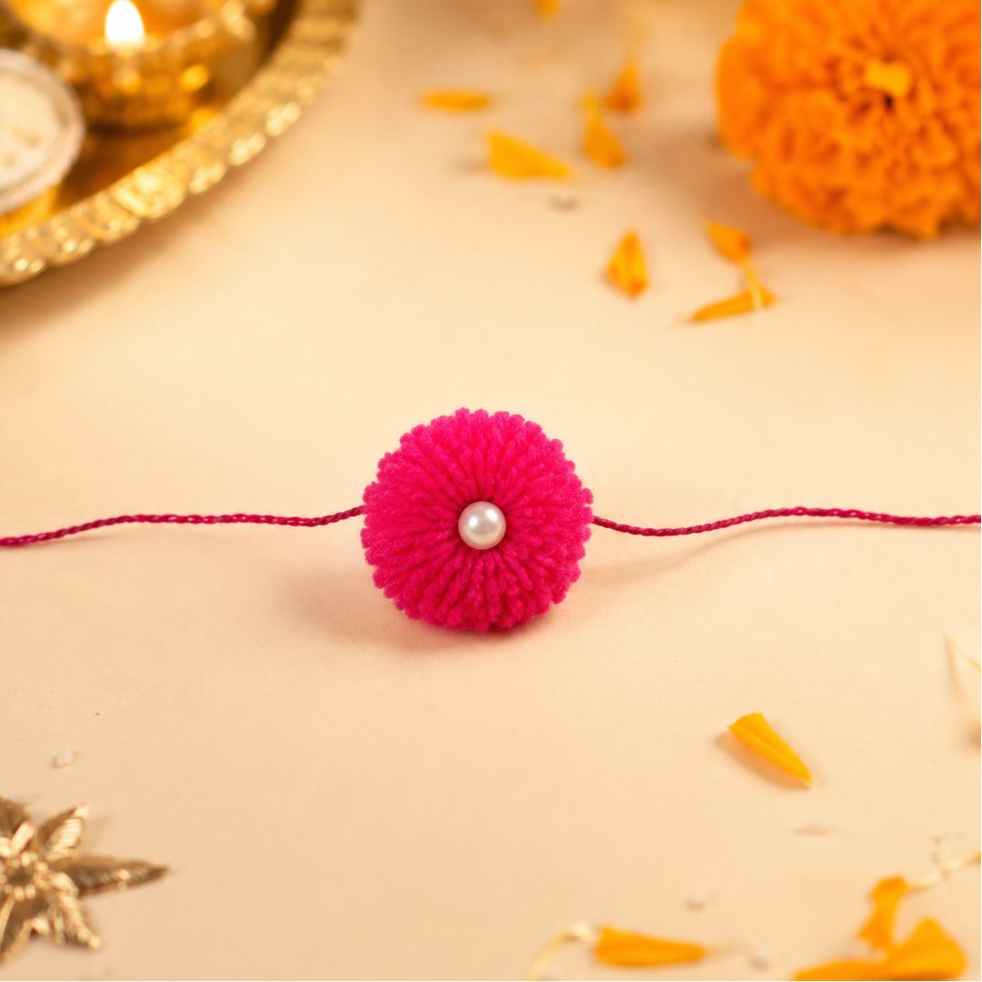 Pulseras | Rakhi Colourful Pom-Pom with Pearl Bead in Pink (€0.50 per unit)